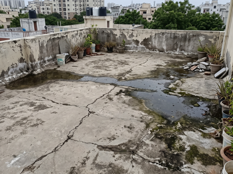 Terrace surface showing signs of water seepage
